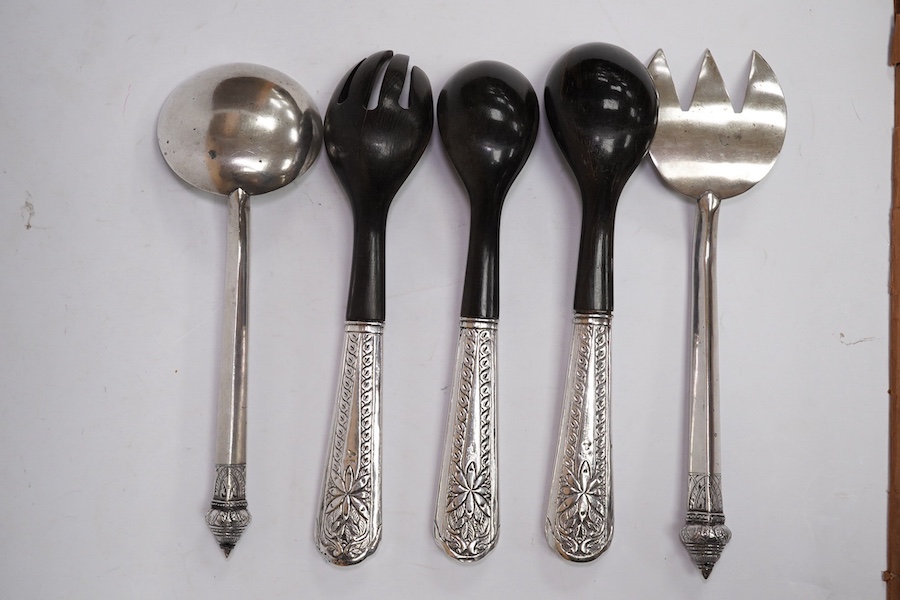 A pair of Malaysian/Indonesian white metal salad servers, fork 25.7cm and three other similar white metal handle horn servers. Condition - fair to good